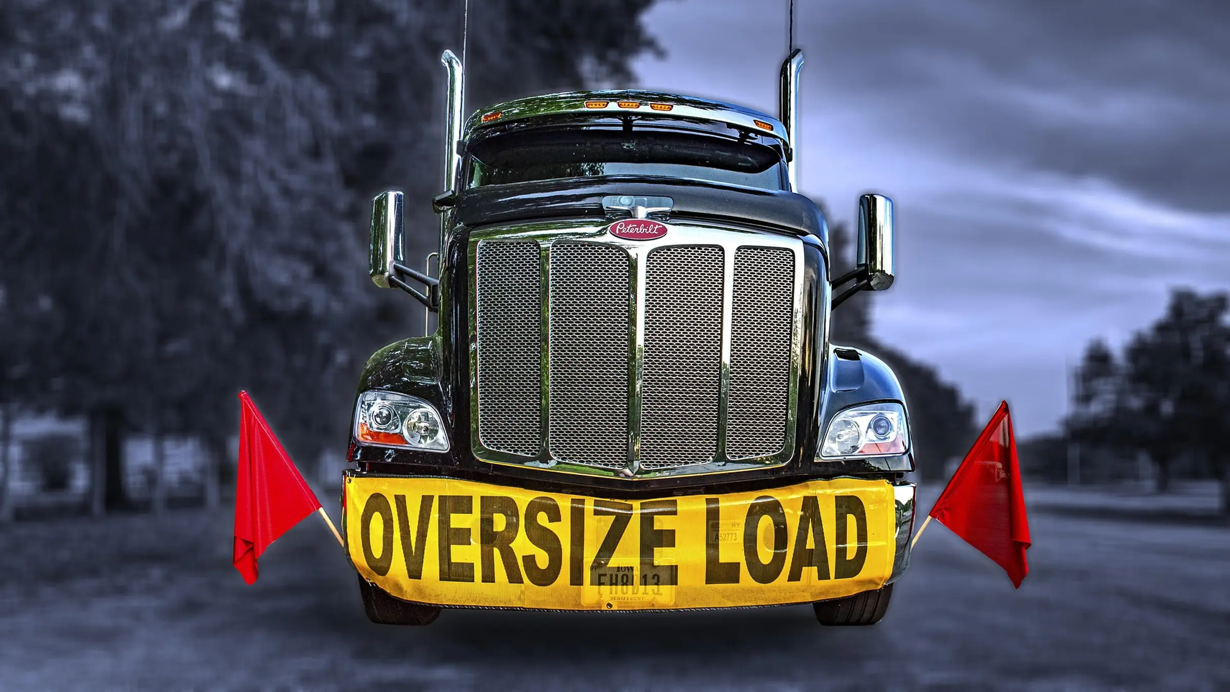 Heavy haul truck marked for an oversize load